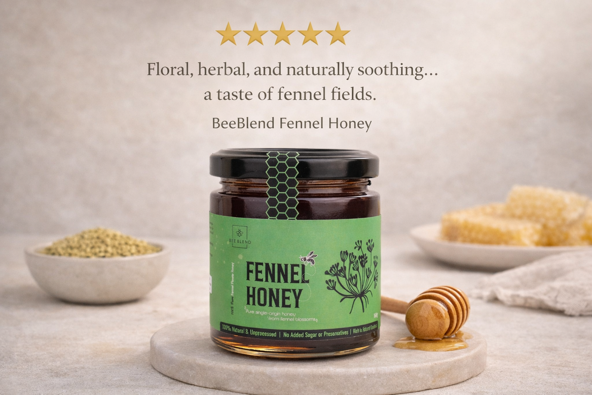 BeeBlend Fennel Honey jar with honey dipper and fennel seeds